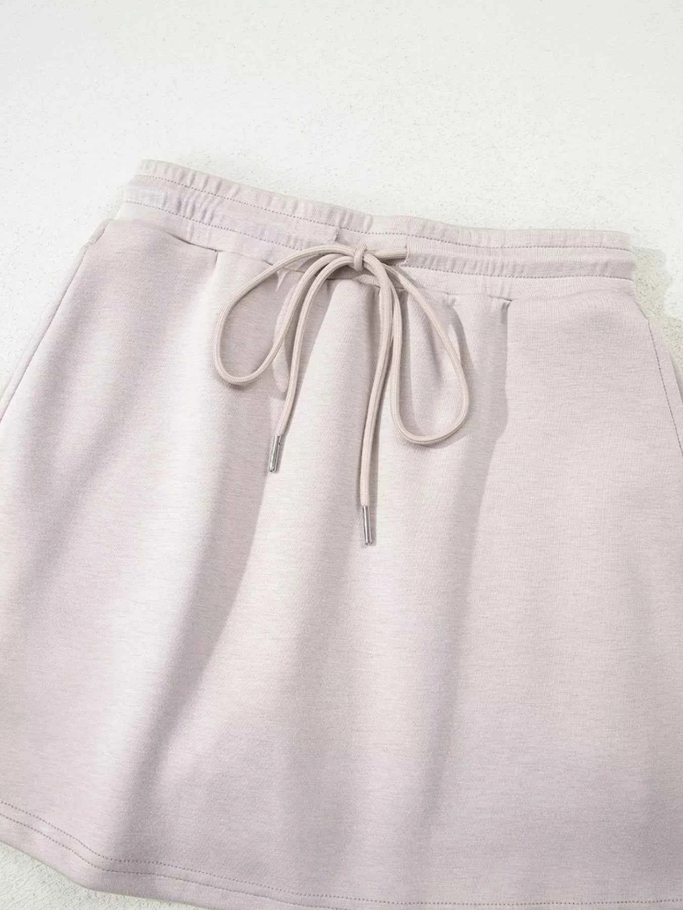 Solid Color Drop Shoulder Pullover and Drawstring Mini Skirt 2pcs Outfit