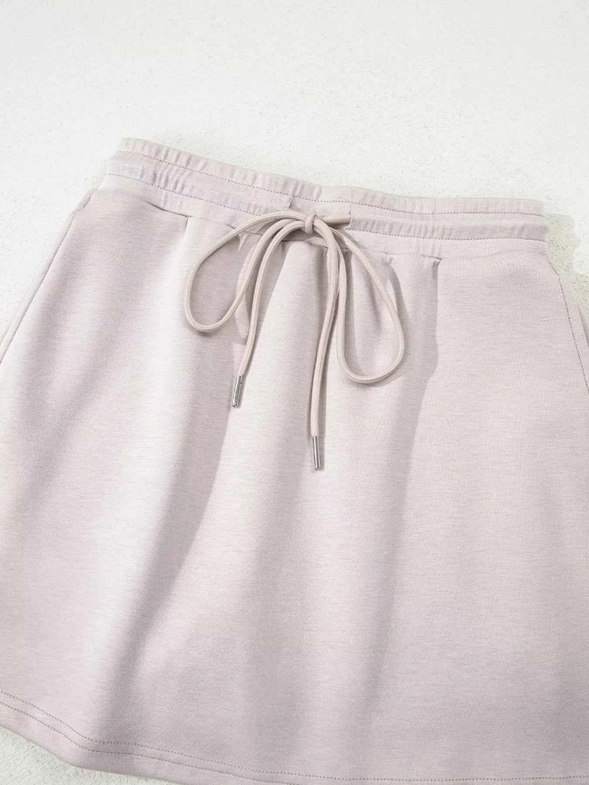 Solid Color Drop Shoulder Pullover and Drawstring Mini Skirt 2pcs Outfit